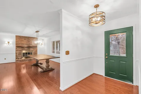 a workspace with furniture and wooden floor