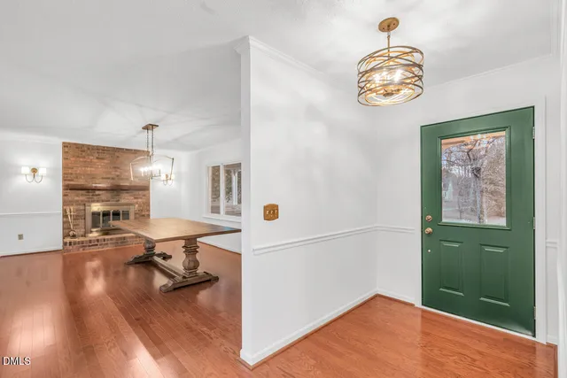 a workspace with furniture and wooden floor