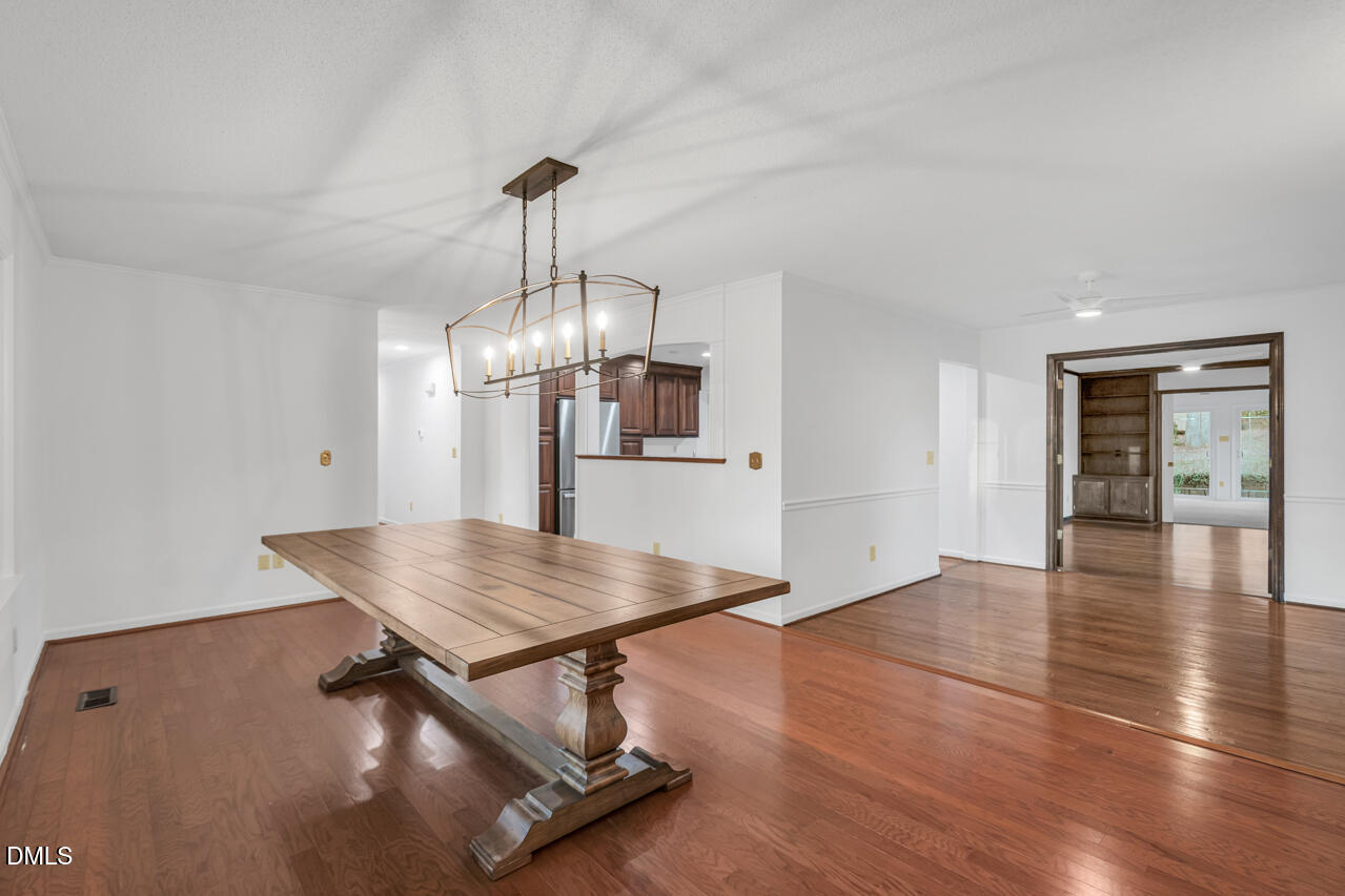 13018 Meadow Ridge Drive Rougemont, NC 27572 - Photo 5 of 26 a room with lots of counter space and wooden floor
