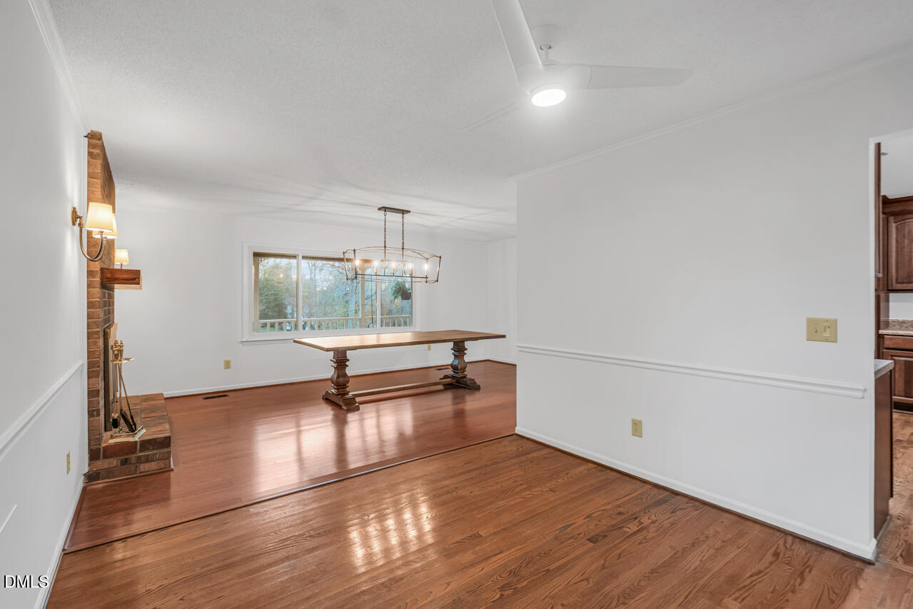 13018 Meadow Ridge Drive Rougemont, NC 27572 - Photo 6 of 26 a view of room with window and wooden floor