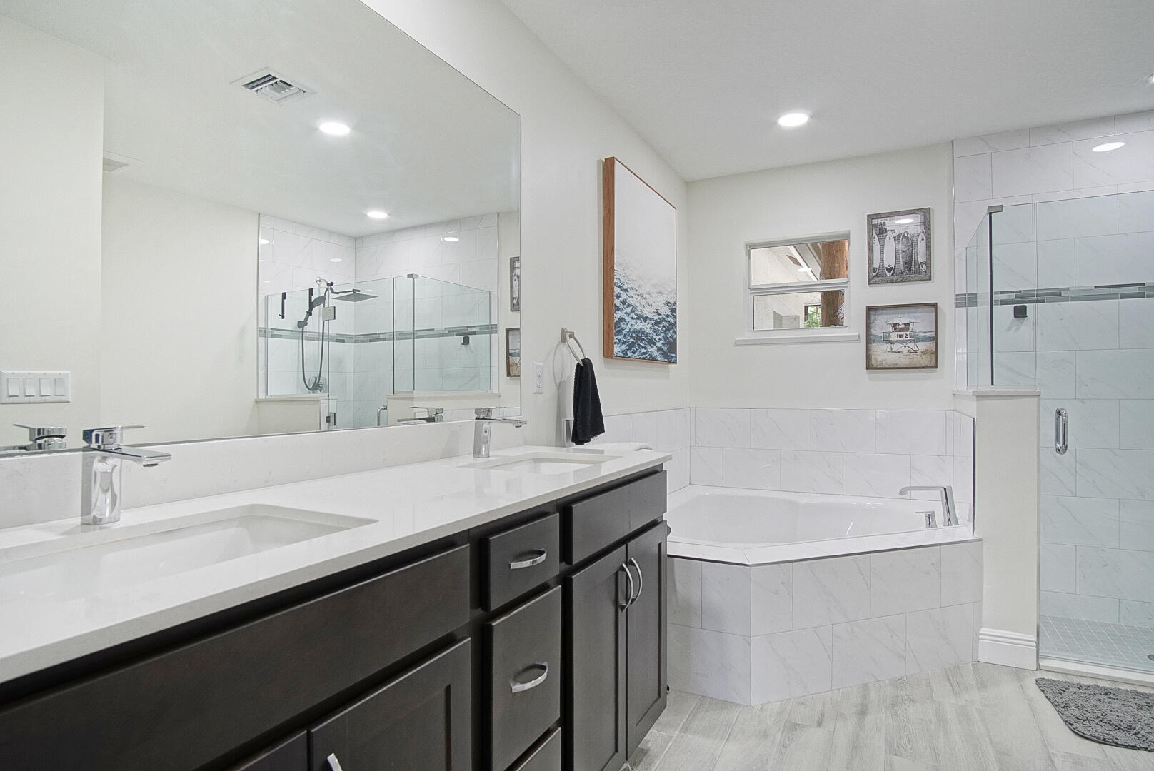 5302 Seagrape Drive Fort Pierce, FL 34982 - Photo 15 of 35 a bathroom with a tub sink and mirror