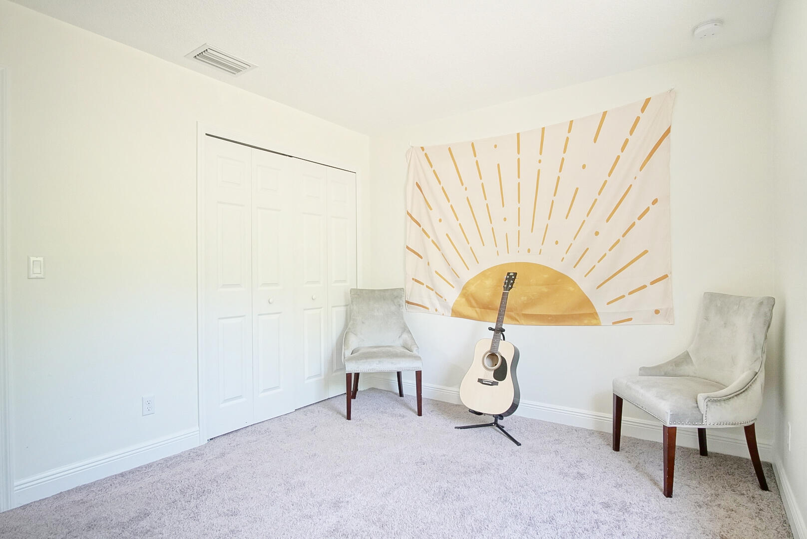 5302 Seagrape Drive Fort Pierce, FL 34982 - Photo 23 of 35 a view of a room with gym equipment and a large window