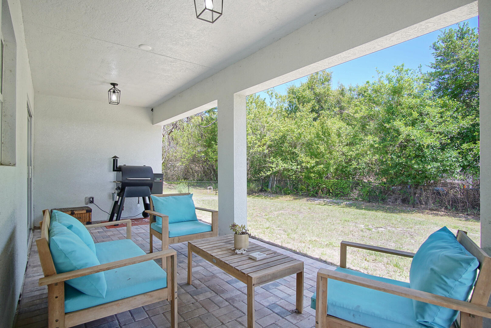 5302 Seagrape Drive Fort Pierce, FL 34982 - Photo 25 of 35 a living room with furniture and a large window