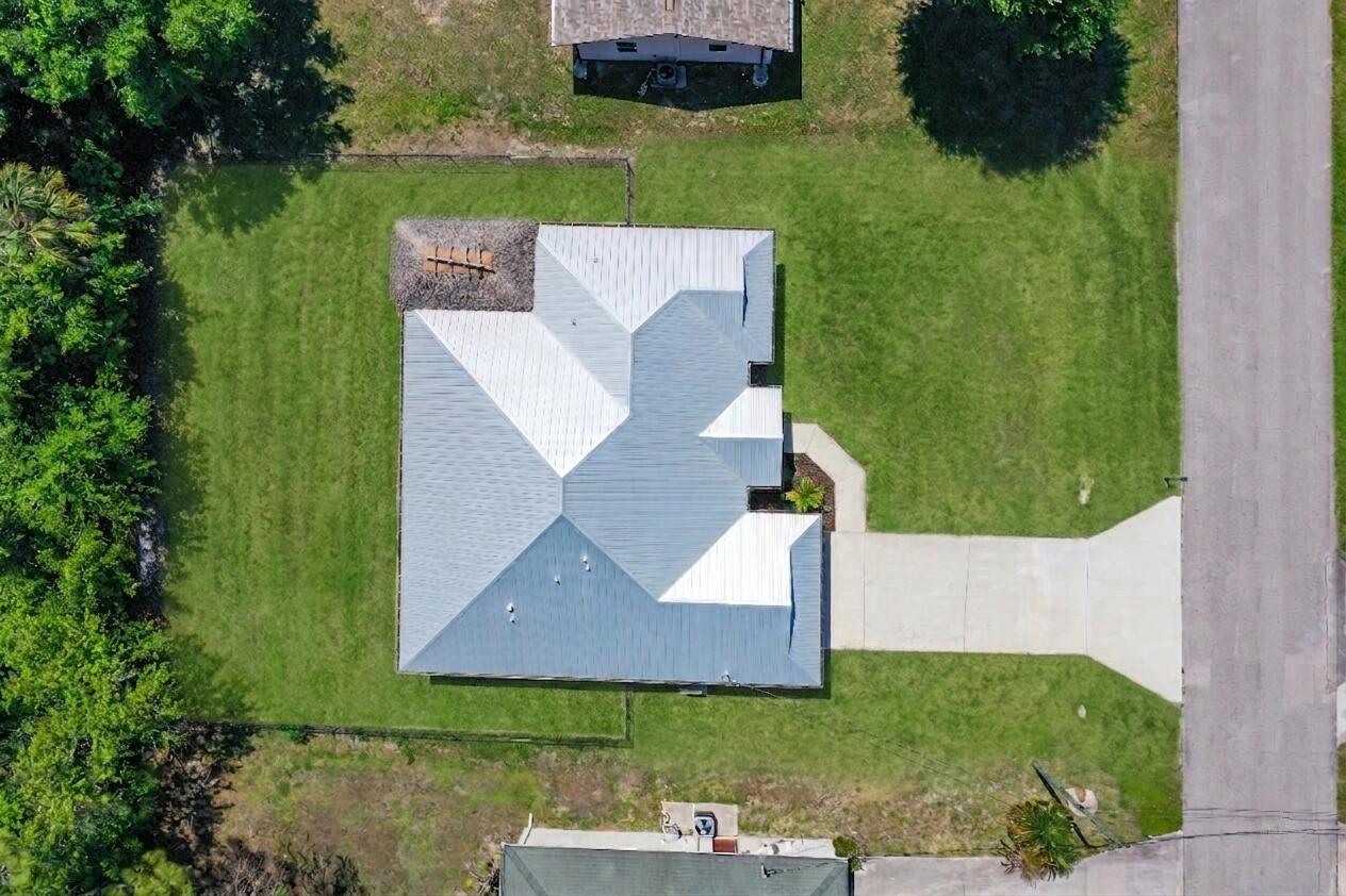 5302 Seagrape Drive Fort Pierce, FL 34982 - Photo 31 of 35 an aerial view of a house