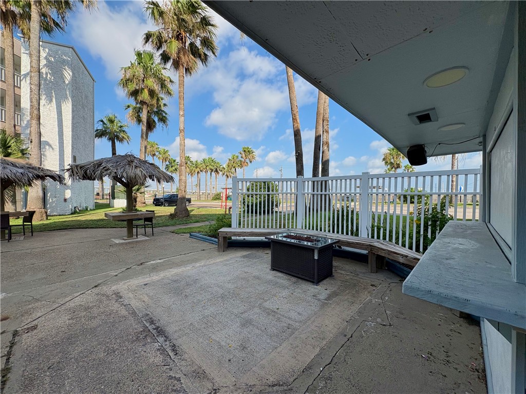 3938 Surfside, Unit 3233 Corpus Christi, TX 78402 - Photo 19 of 23 a view of a bench in patio