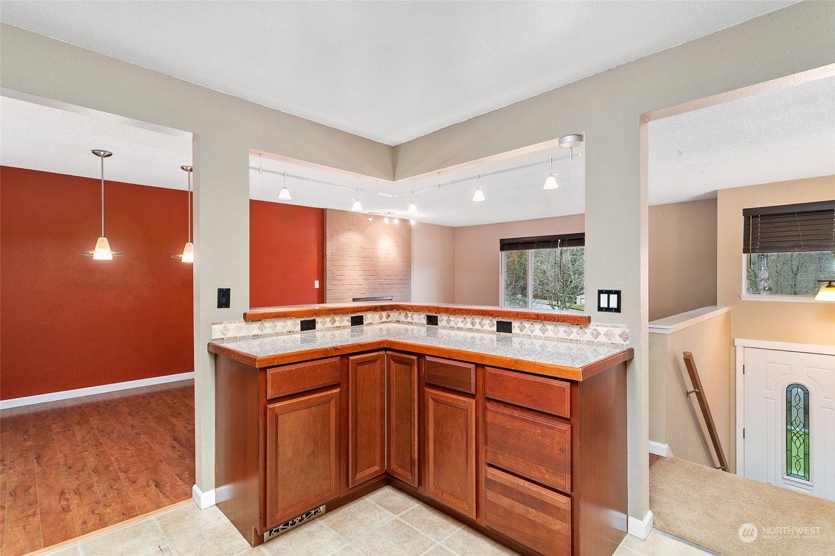 26007 36th Place South Kent, WA 98032 - Photo 14 of 37 a kitchen with a sink and cabinets