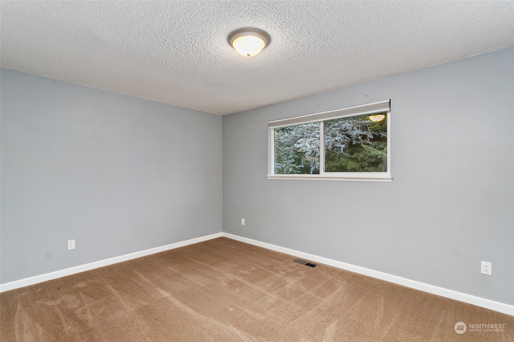 26007 36th Place South Kent, WA 98032 - Photo 17 of 37 an empty room with a window