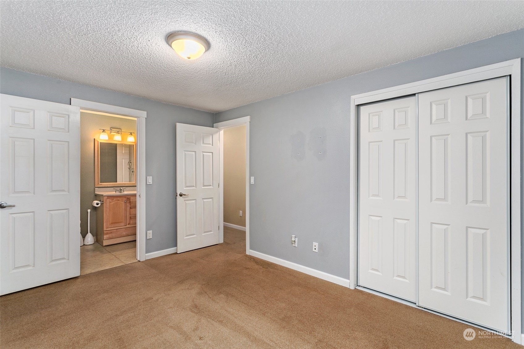26007 36th Place South Kent, WA 98032 - Photo 18 of 37 a view of an empty room and closet area