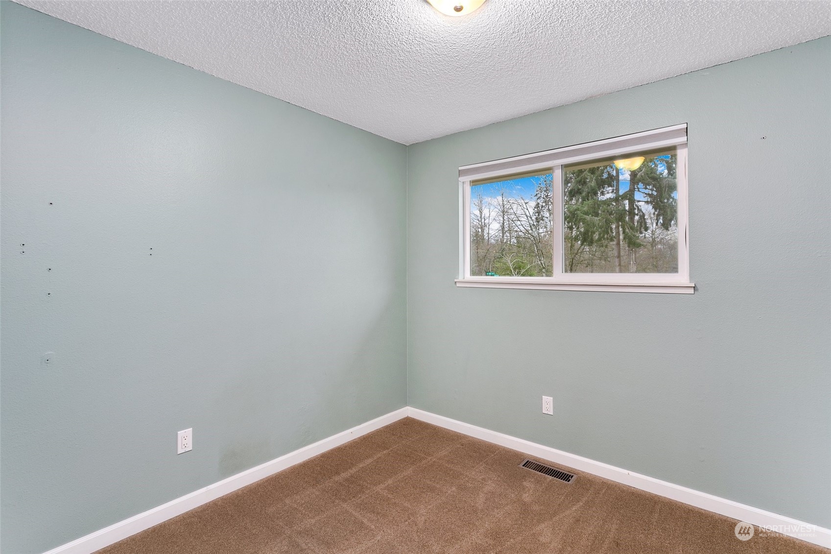 26007 36th Place South Kent, WA 98032 - Photo 19 of 37 an empty room with a window