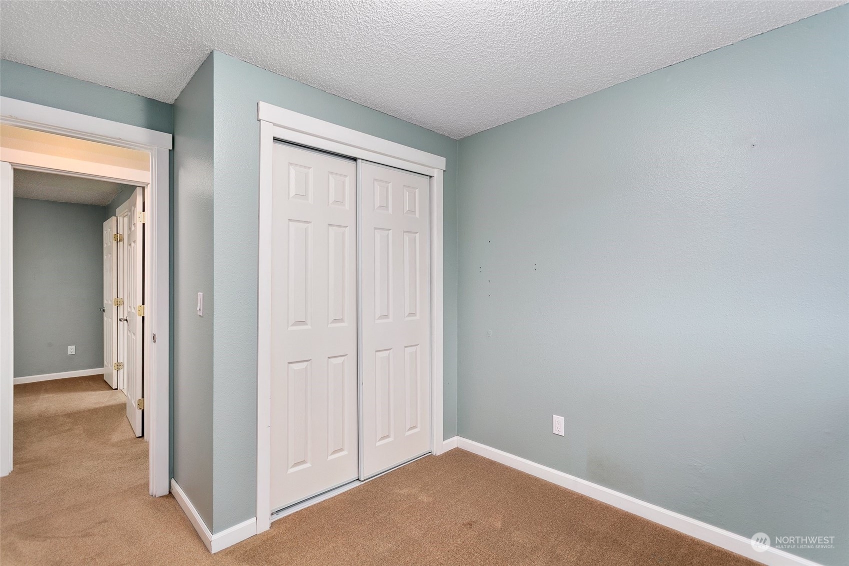 26007 36th Place South Kent, WA 98032 - Photo 20 of 37 an empty room with closet area