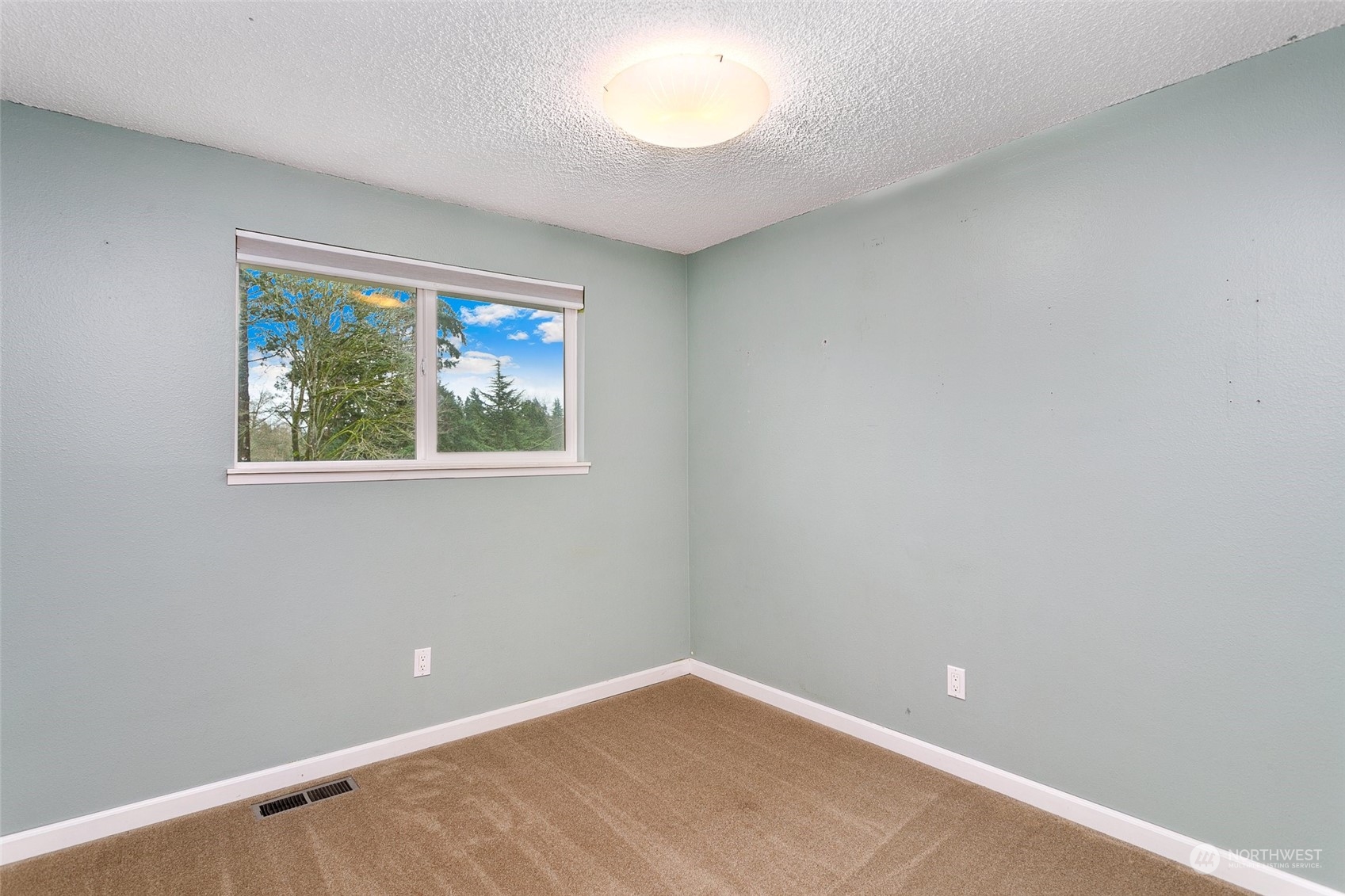 26007 36th Place South Kent, WA 98032 - Photo 21 of 37 an empty room with a window