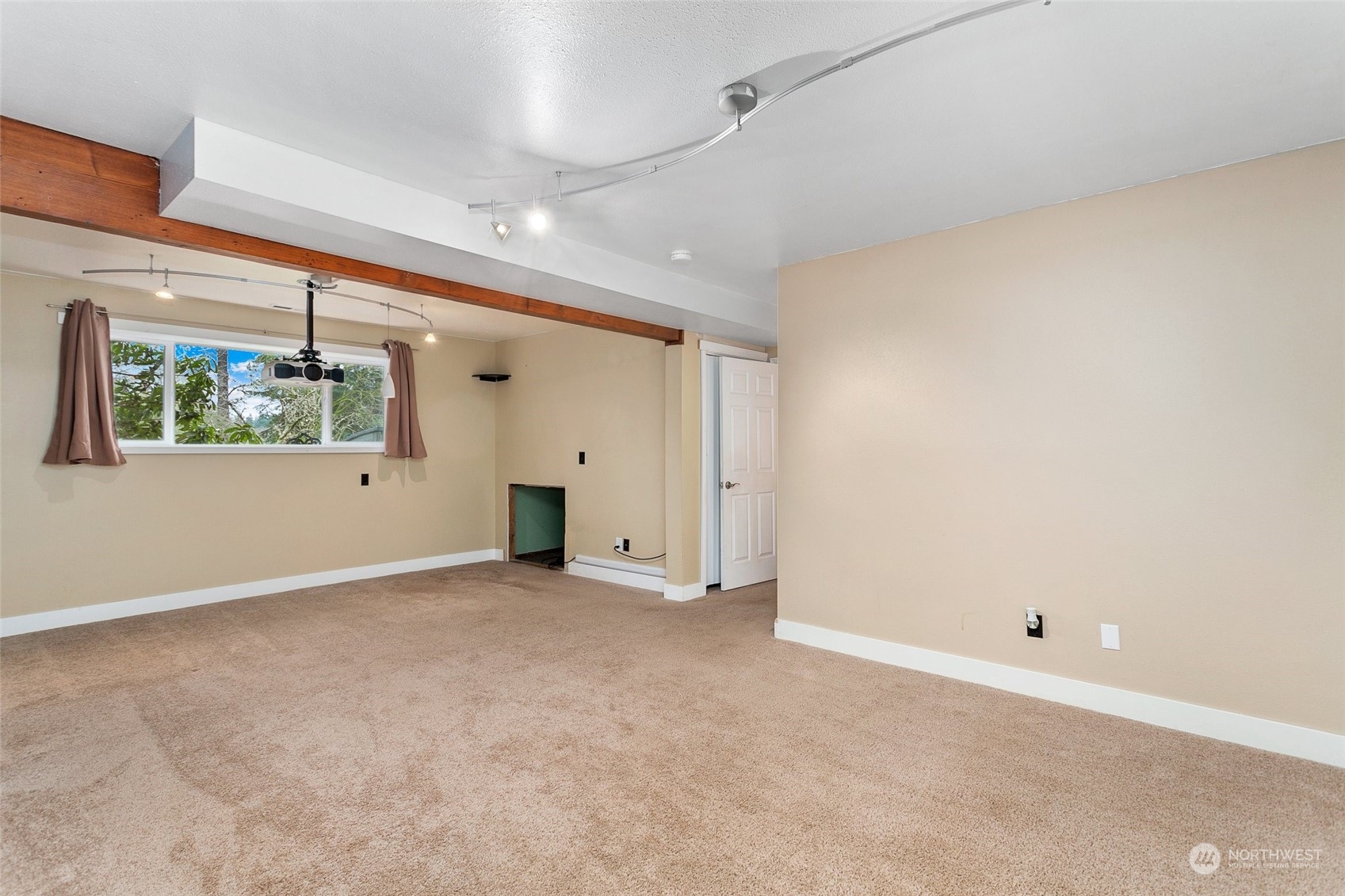 26007 36th Place South Kent, WA 98032 - Photo 26 of 37 an empty room with windows