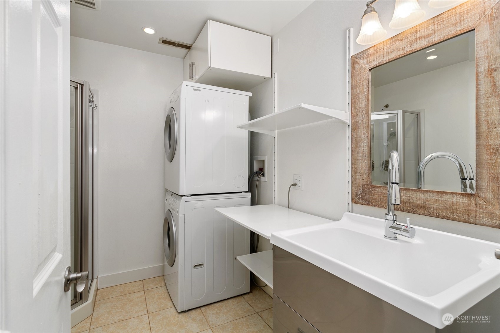 26007 36th Place South Kent, WA 98032 - Photo 27 of 37 a bathroom with a sink toilet and mirror