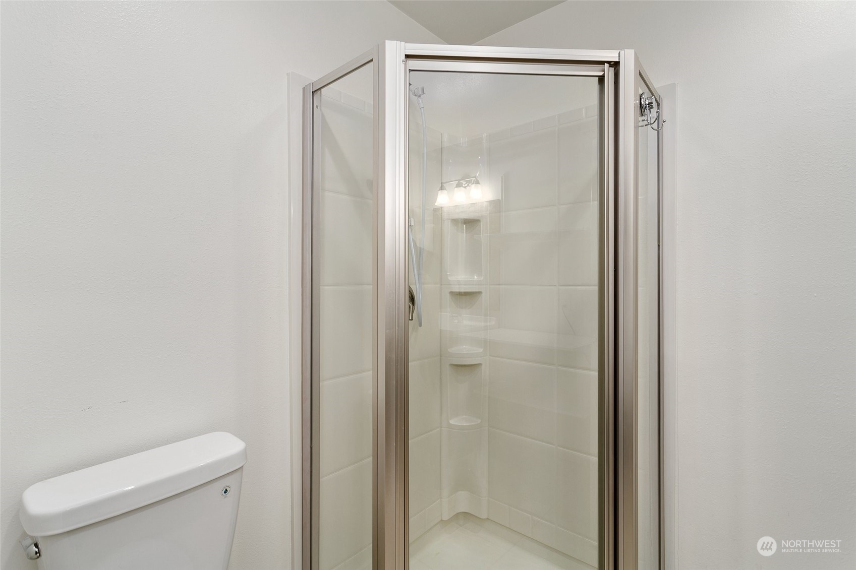 26007 36th Place South Kent, WA 98032 - Photo 29 of 37 a bathroom with a shower a toilet and sink
