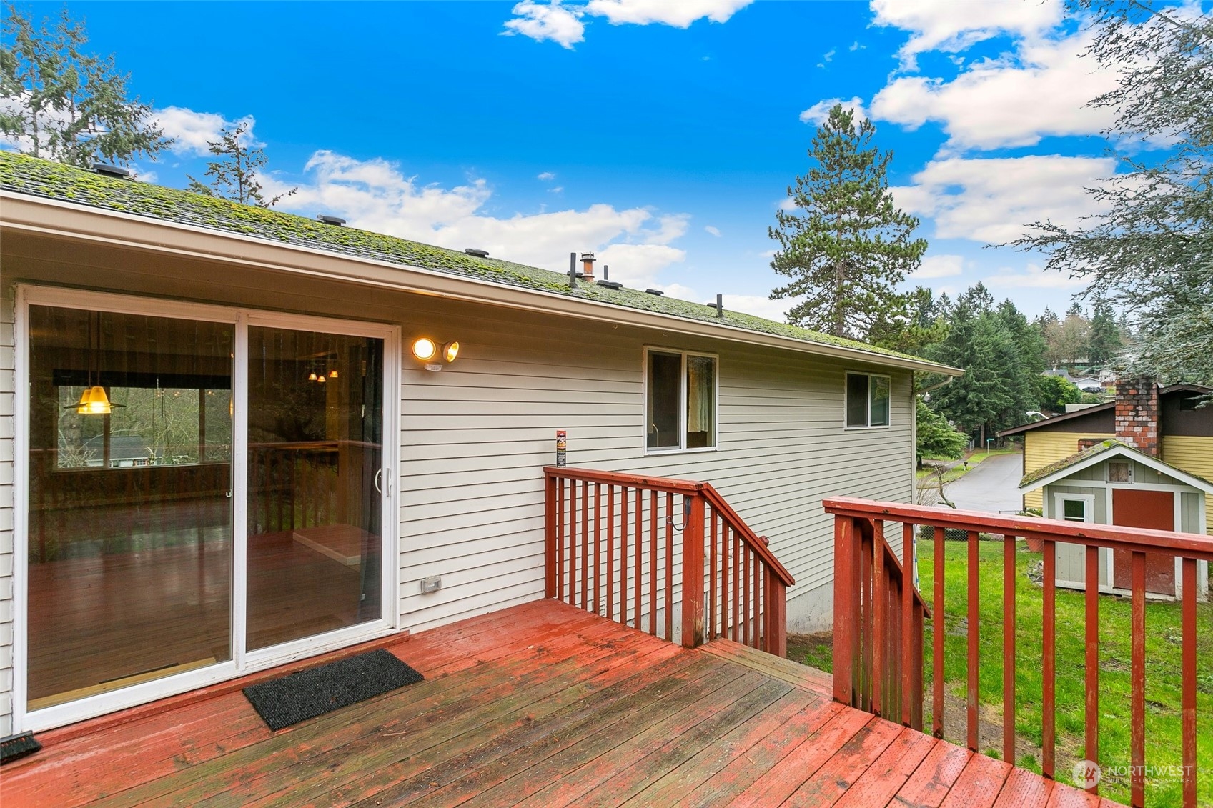 26007 36th Place South Kent, WA 98032 - Photo 31 of 37 a view of a house with wooden deck