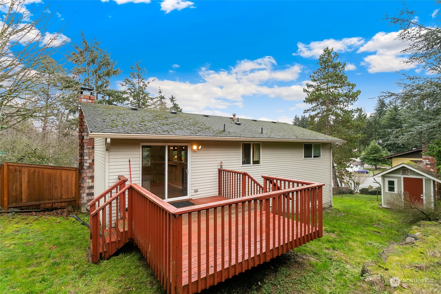26007 36th Place South Kent, WA 98032 - Photo 32 of 37 a view of a house with a yard and deck