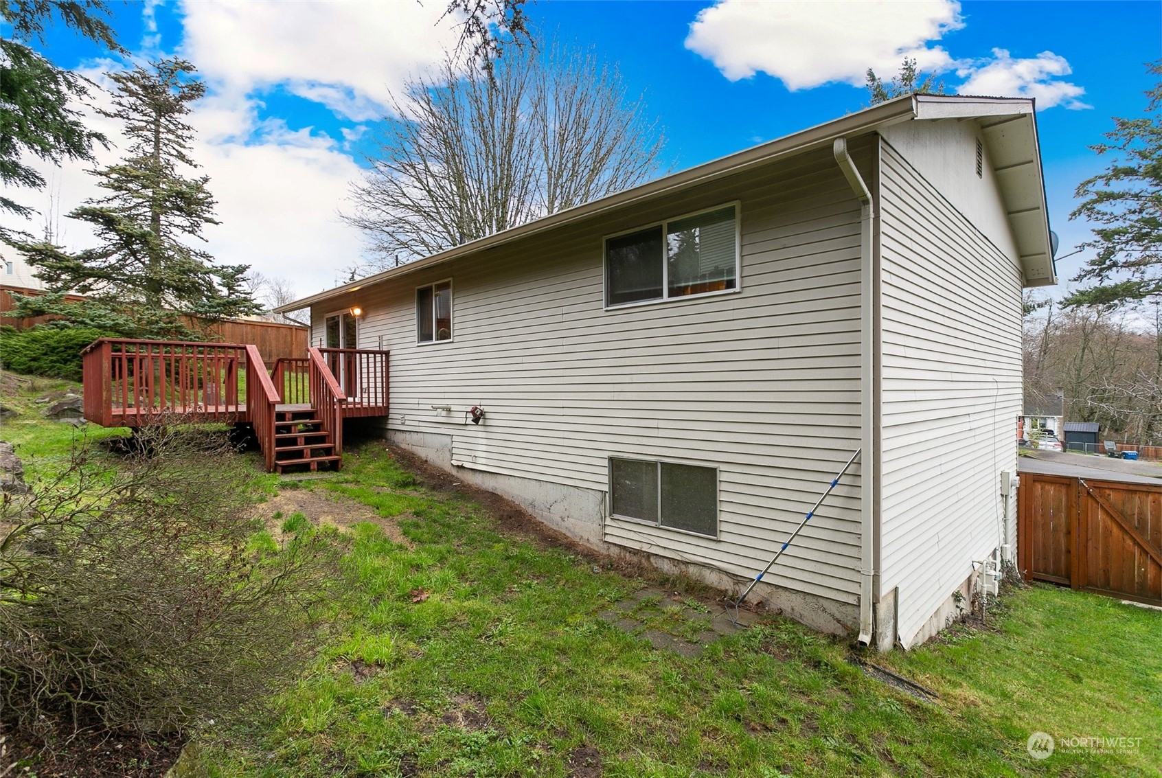 26007 36th Place South Kent, WA 98032 - Photo 34 of 37 a view of a white house with a yard