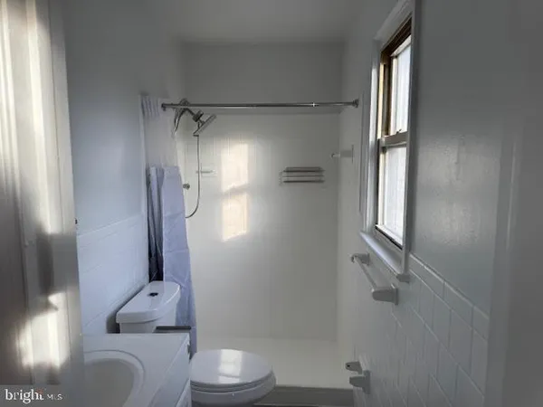 a bathroom with a mirror