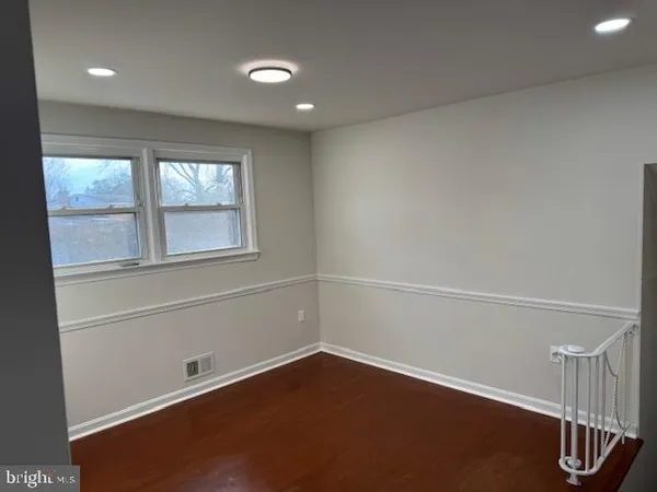 a bathroom with a shower and a toilet