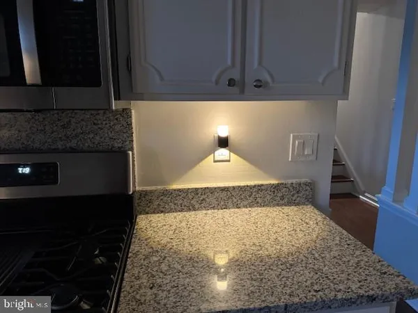 a living room with granite countertop