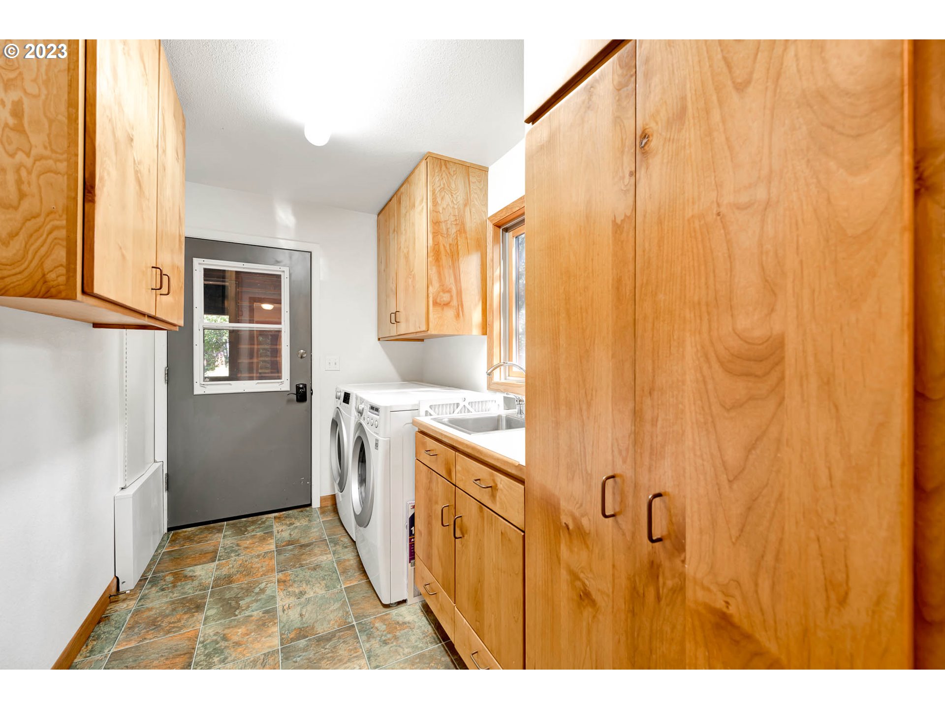 77383 Mosby Creek Road Cottage Grove, OR 97424 - Photo 16 of 48 a bathroom with a sink and a shower
