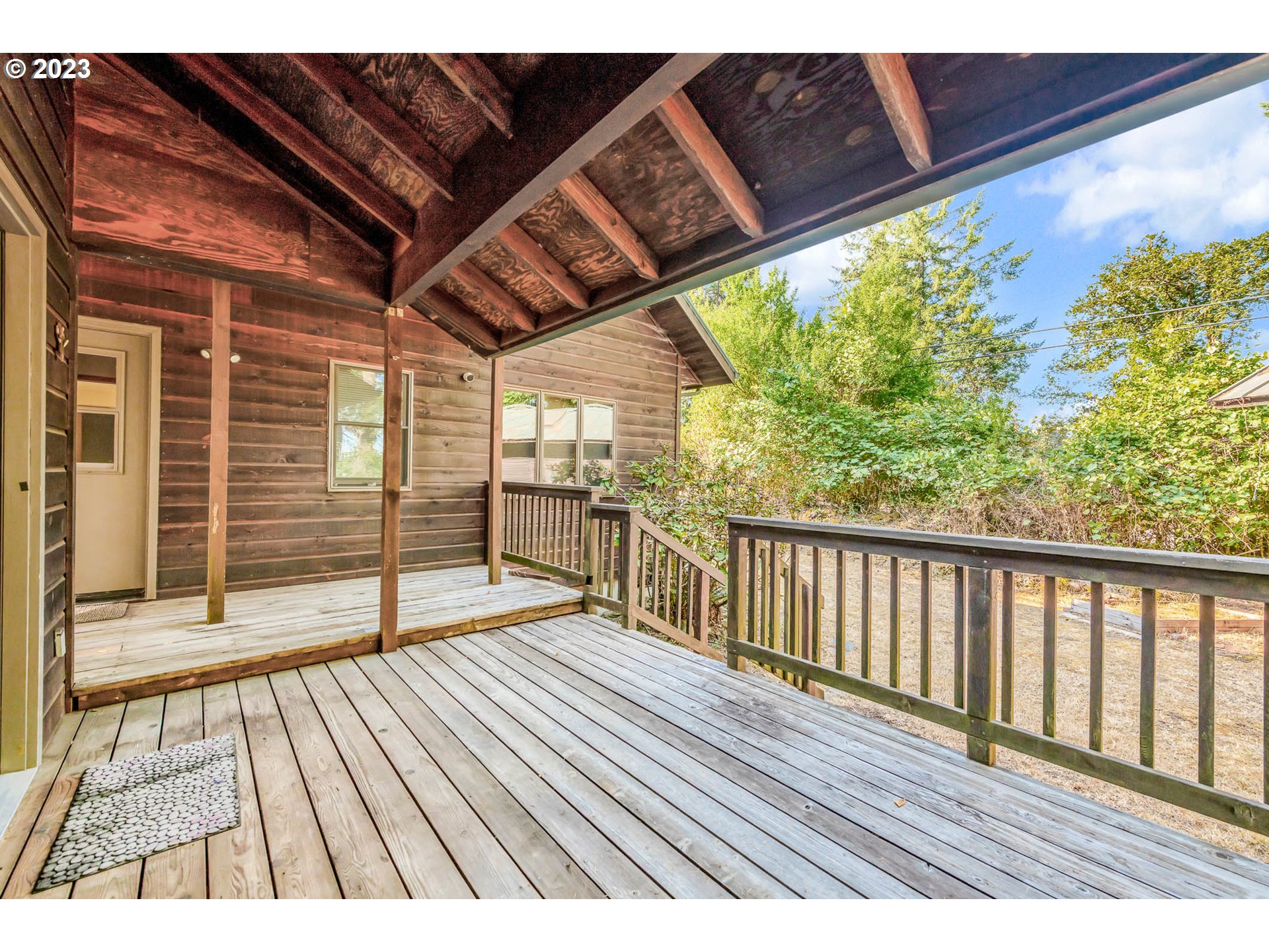 77383 Mosby Creek Road Cottage Grove, OR 97424 - Photo 29 of 48 a view of balcony with wooden floor
