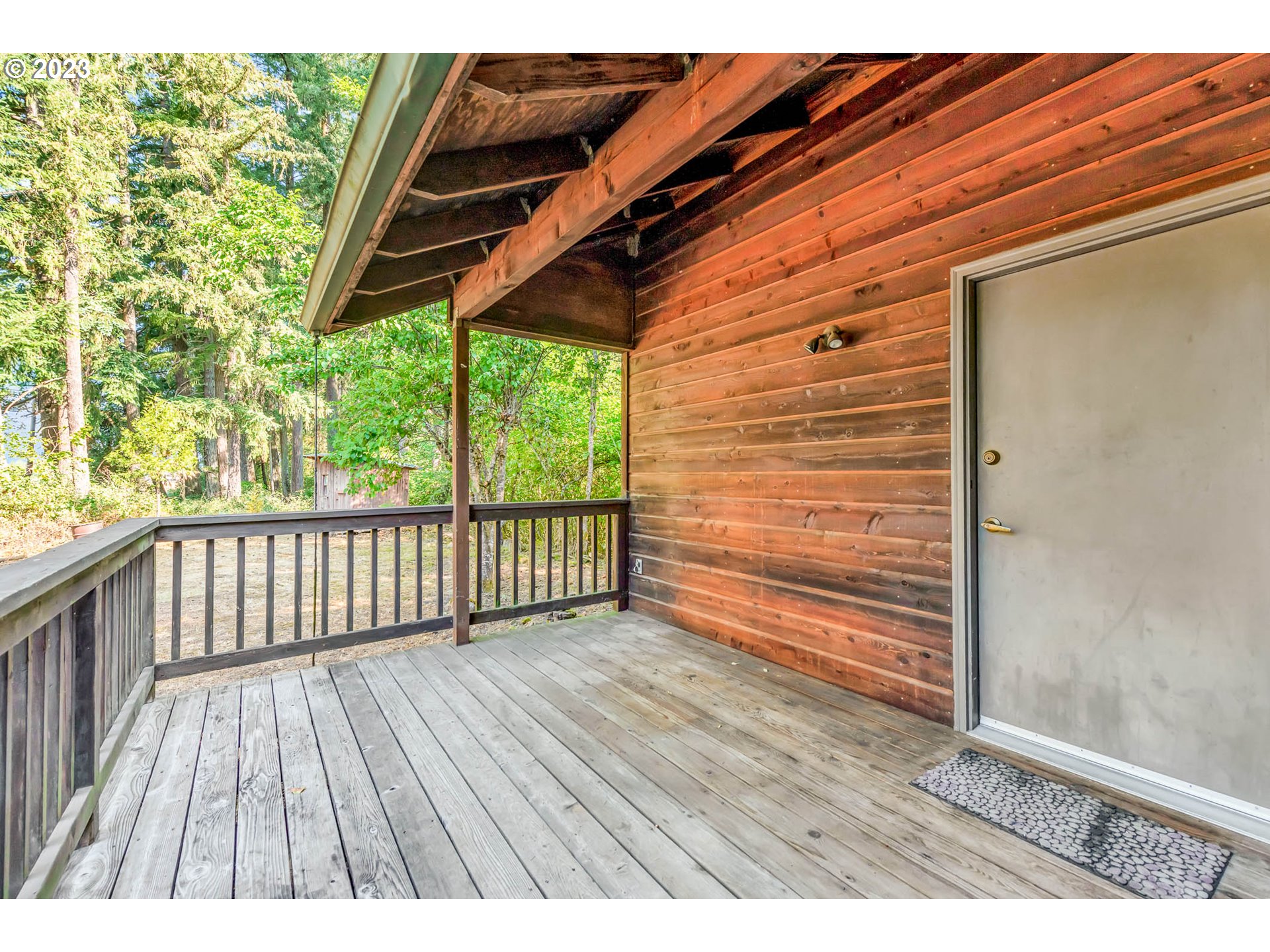 77383 Mosby Creek Road Cottage Grove, OR 97424 - Photo 32 of 48 a view of outdoor space with wooden floor
