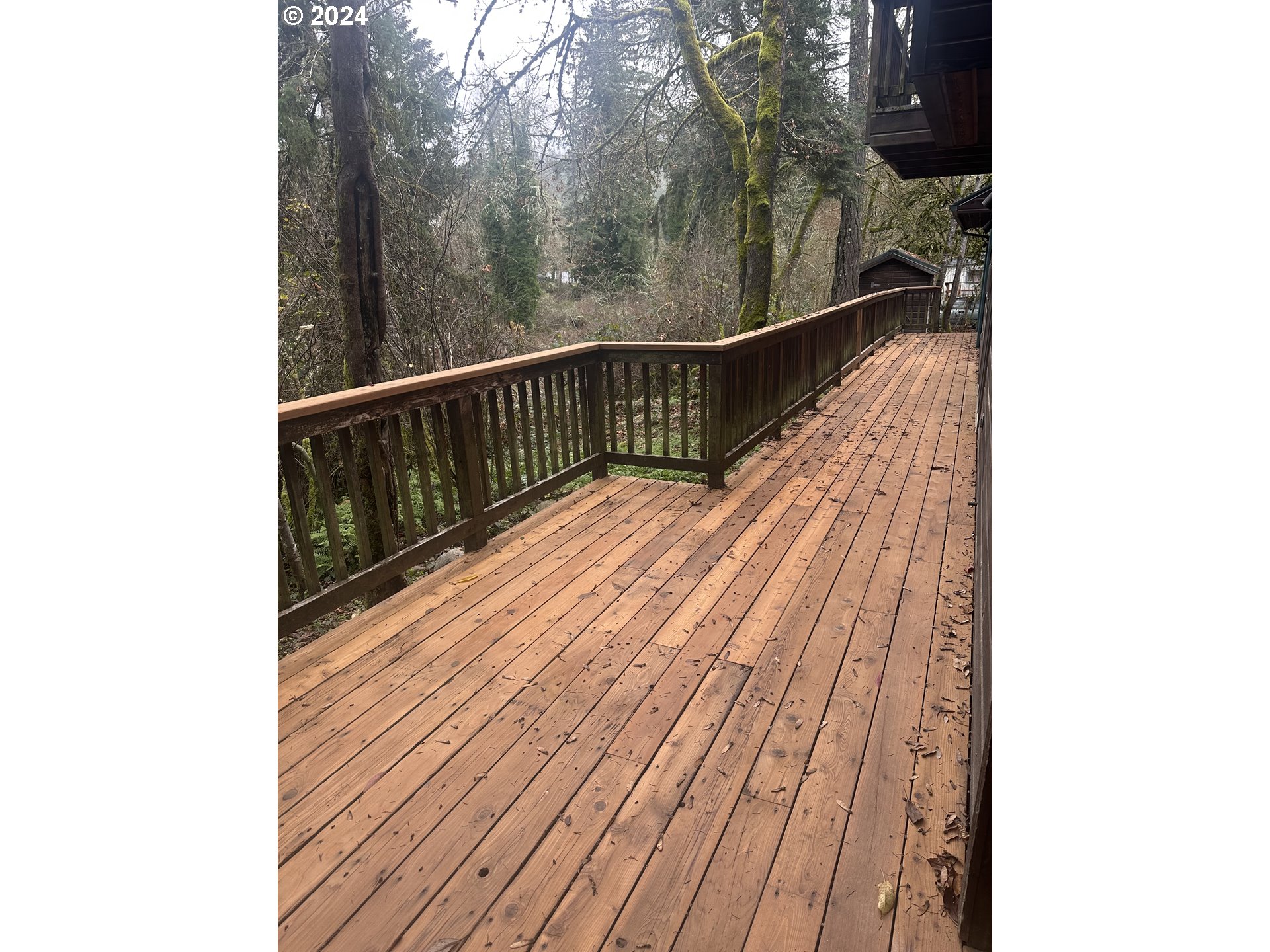 77383 Mosby Creek Road Cottage Grove, OR 97424 - Photo 48 of 48 a view of balcony with wooden floor