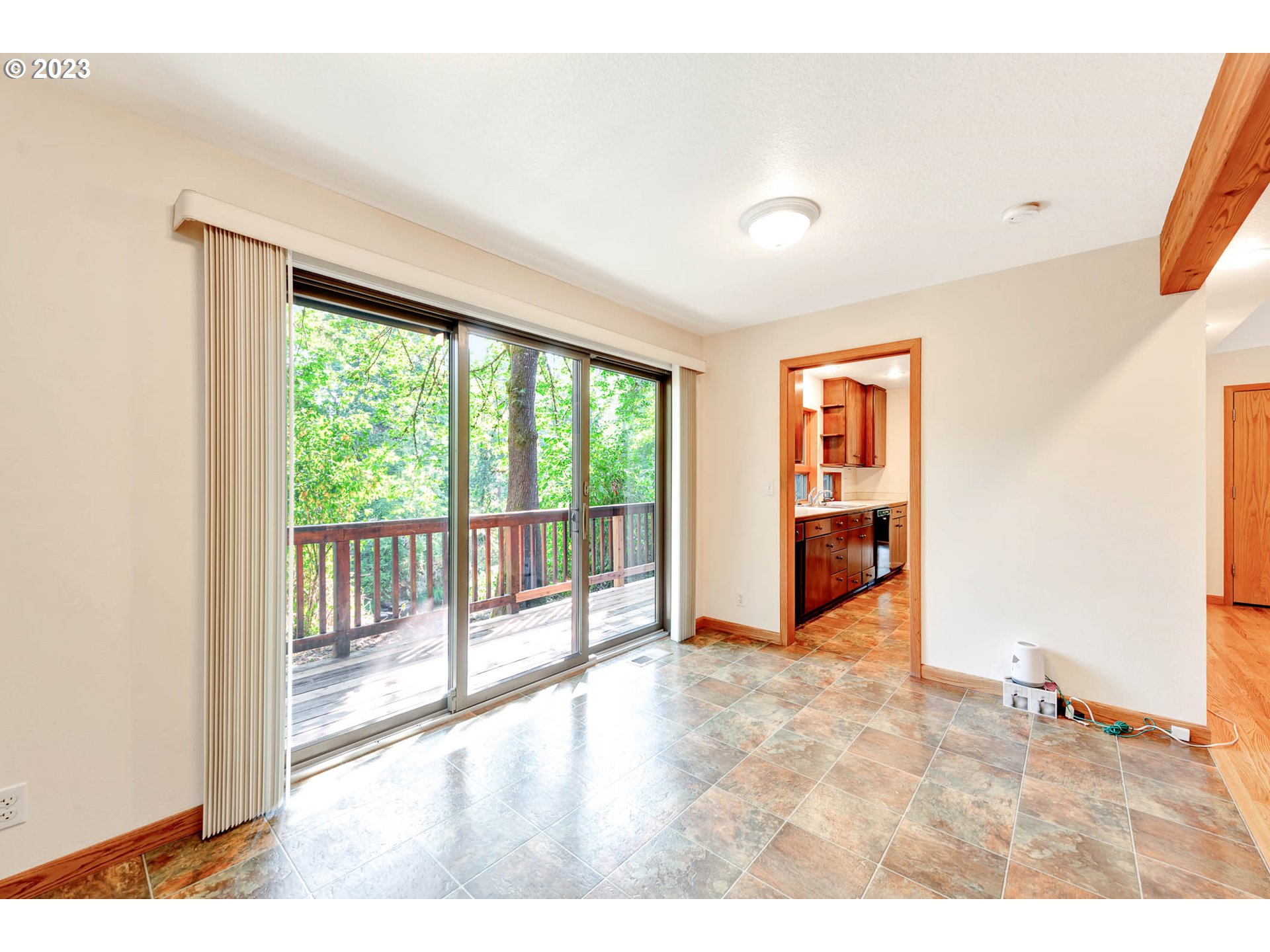 77383 Mosby Creek Road Cottage Grove, OR 97424 - Photo 10 of 48 a big room with wooden floor and windows