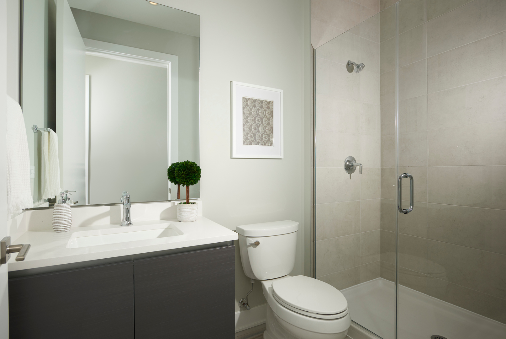 6 North Bishop Street, Unit 203 Chicago, IL 60607 - Photo 14 of 17 a bathroom with a sink vanity mirror and toilet
