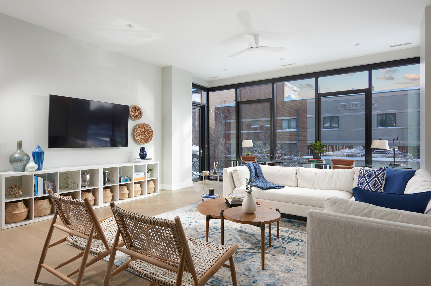 6 North Bishop Street, Unit 203 Chicago, IL 60607 - Photo 9 of 17 a living room with furniture and a flat screen tv