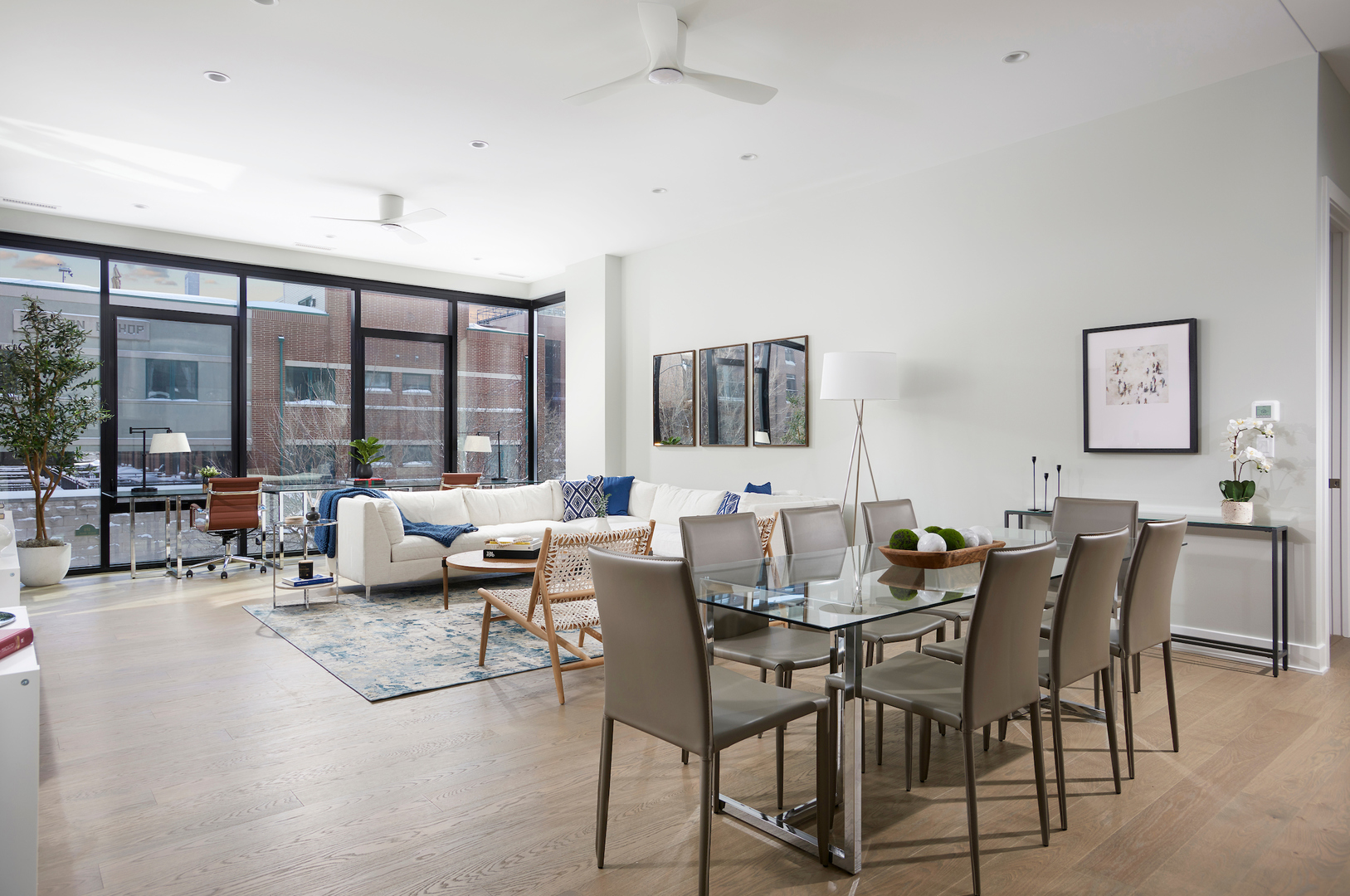 6 North Bishop Street, Unit 203 Chicago, IL 60607 - Photo 10 of 17 a living room with furniture and large windows
