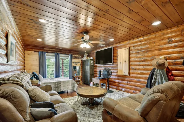 a view of a house with a yard porch and sitting area