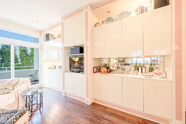a view of kitchen with furniture and large window