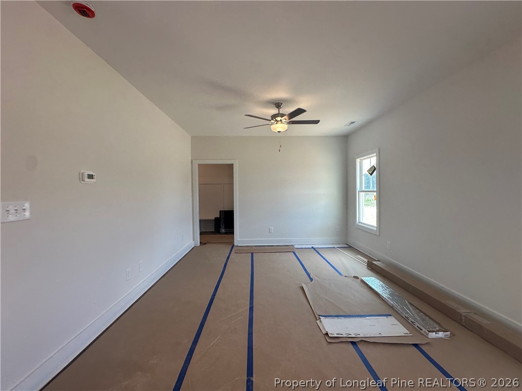 8383 Shannon Road Shannon, NC 28386 - Photo 8 of 17 a view of an empty room and window