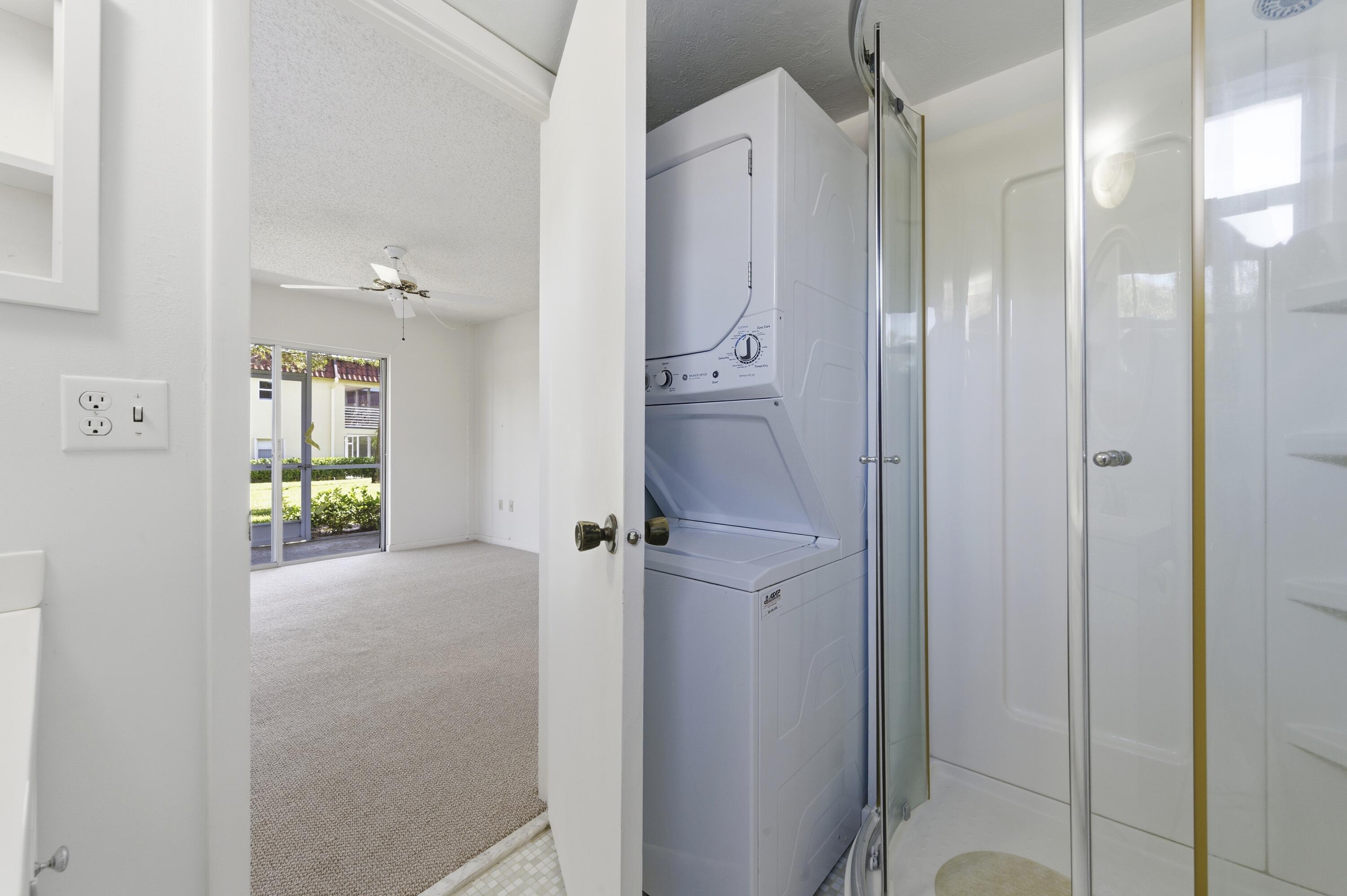 717 Highway 1, Unit 201 Jupiter, FL 33477 - Photo 10 of 31 a bathroom with a shower