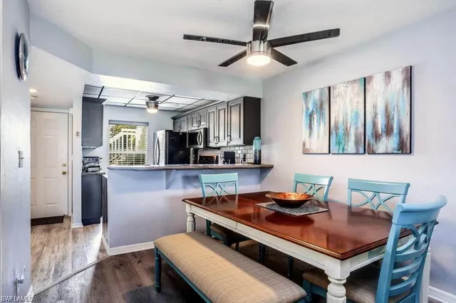 a view of a dining room with furniture