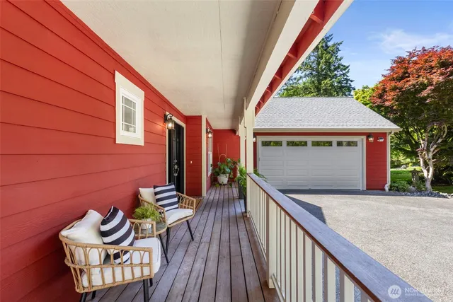 swimming pool view with a seating space