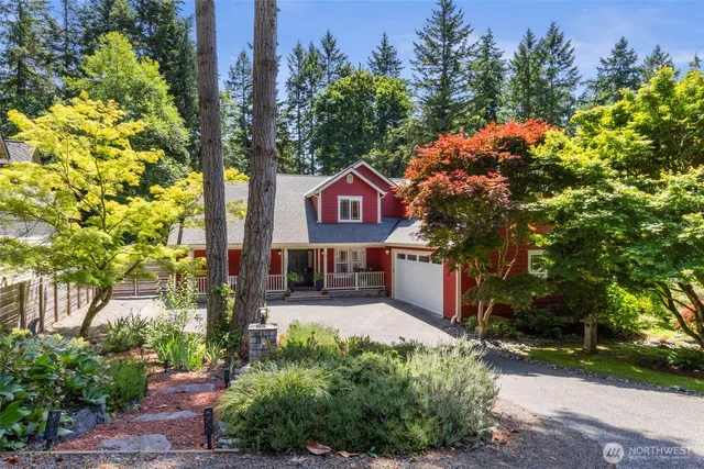 a sign that is sitting in front of a house