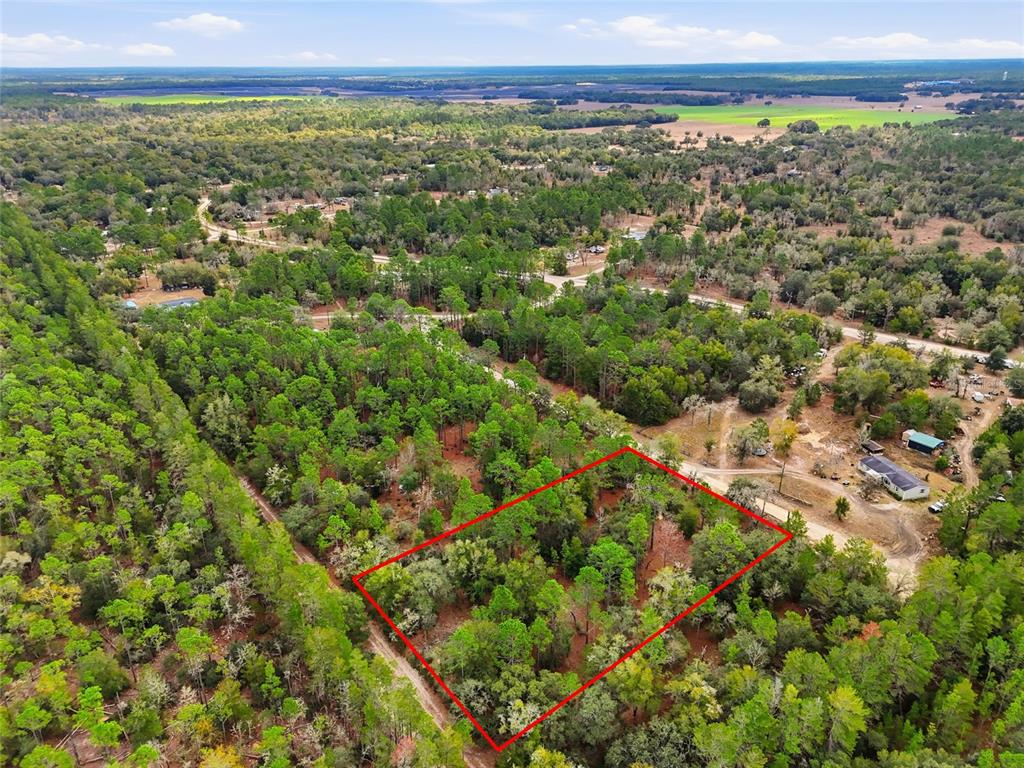 0 Northeast 111th Street Bronson, FL 32621 - Photo 4 of 13 a view of a large building