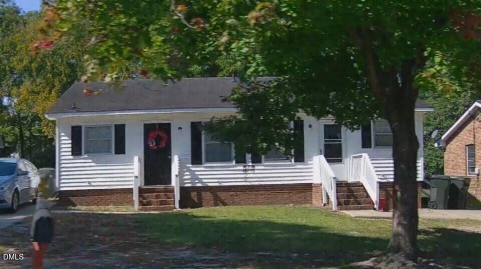 808 Crawford Street South Wilson, NC 27893 - Photo 2 of 11 a front view of a house with a yard