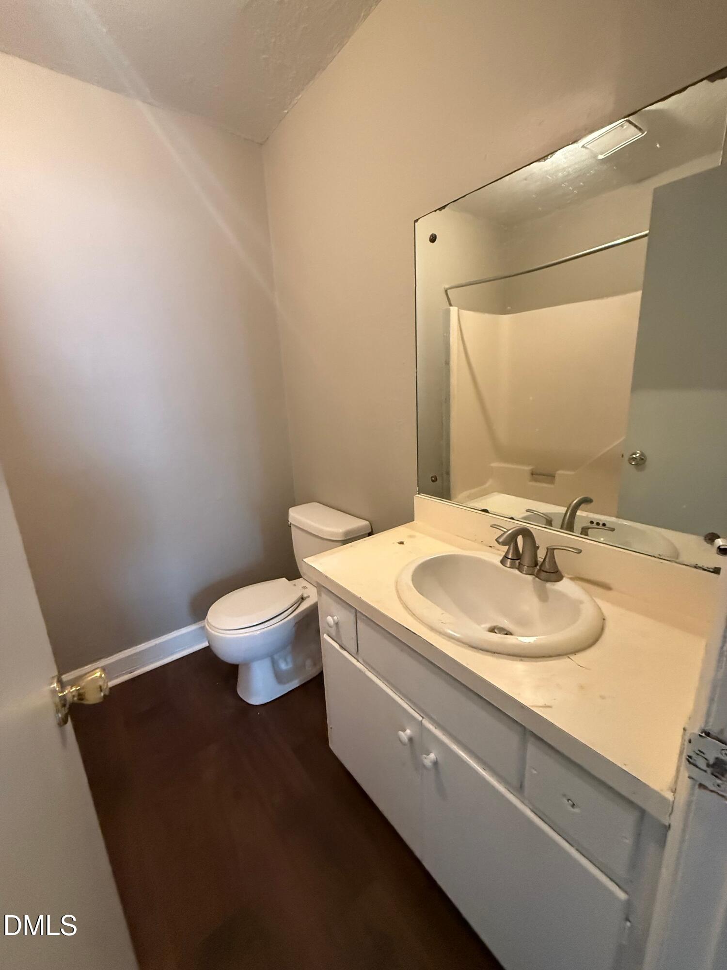 808 Crawford Street South Wilson, NC 27893 - Photo 6 of 11 a bathroom with a sink and a toilet