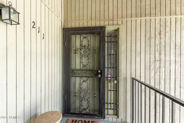 a view of a bathroom with a door and a window