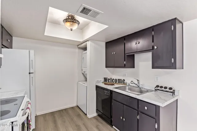 a bathroom with a sink vanity and a mirror