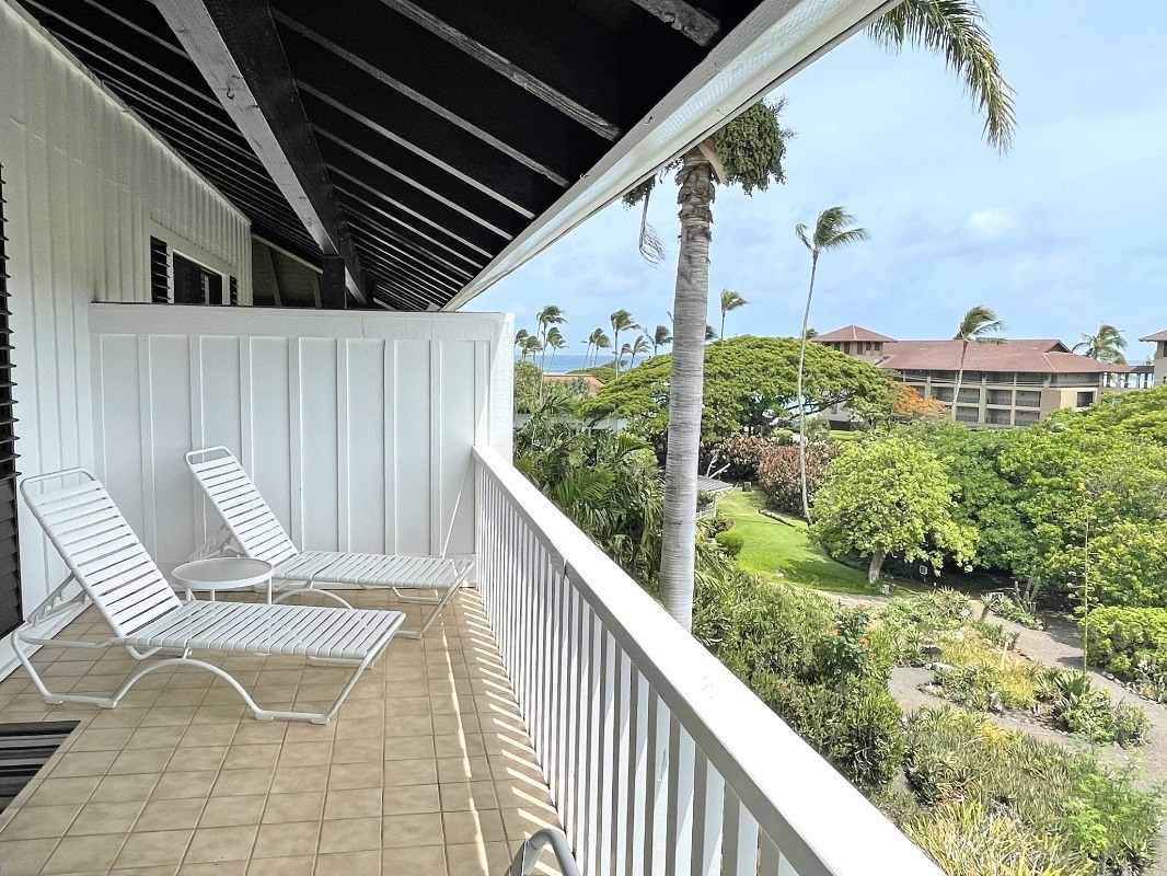 2253 Poipu Road, Unit 317 Koloa, HI 96756 - Photo 5 of 16 a balcony view with couple of chairs