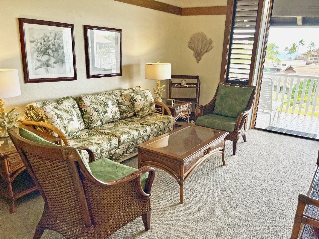 2253 Poipu Road, Unit 317 Koloa, HI 96756 - Photo 7 of 16 a living room with furniture and a window