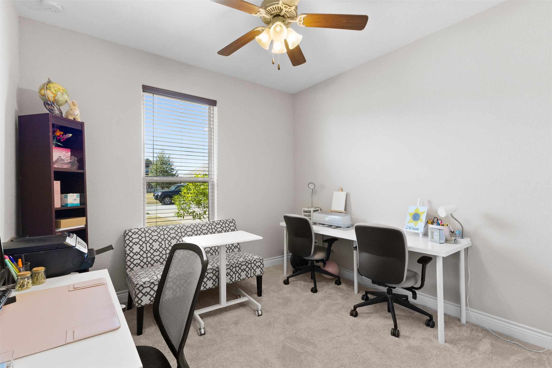3010 Nobel Court Bryan, TX 77808 - Photo 18 of 23 a view of a workspace with furniture and a window