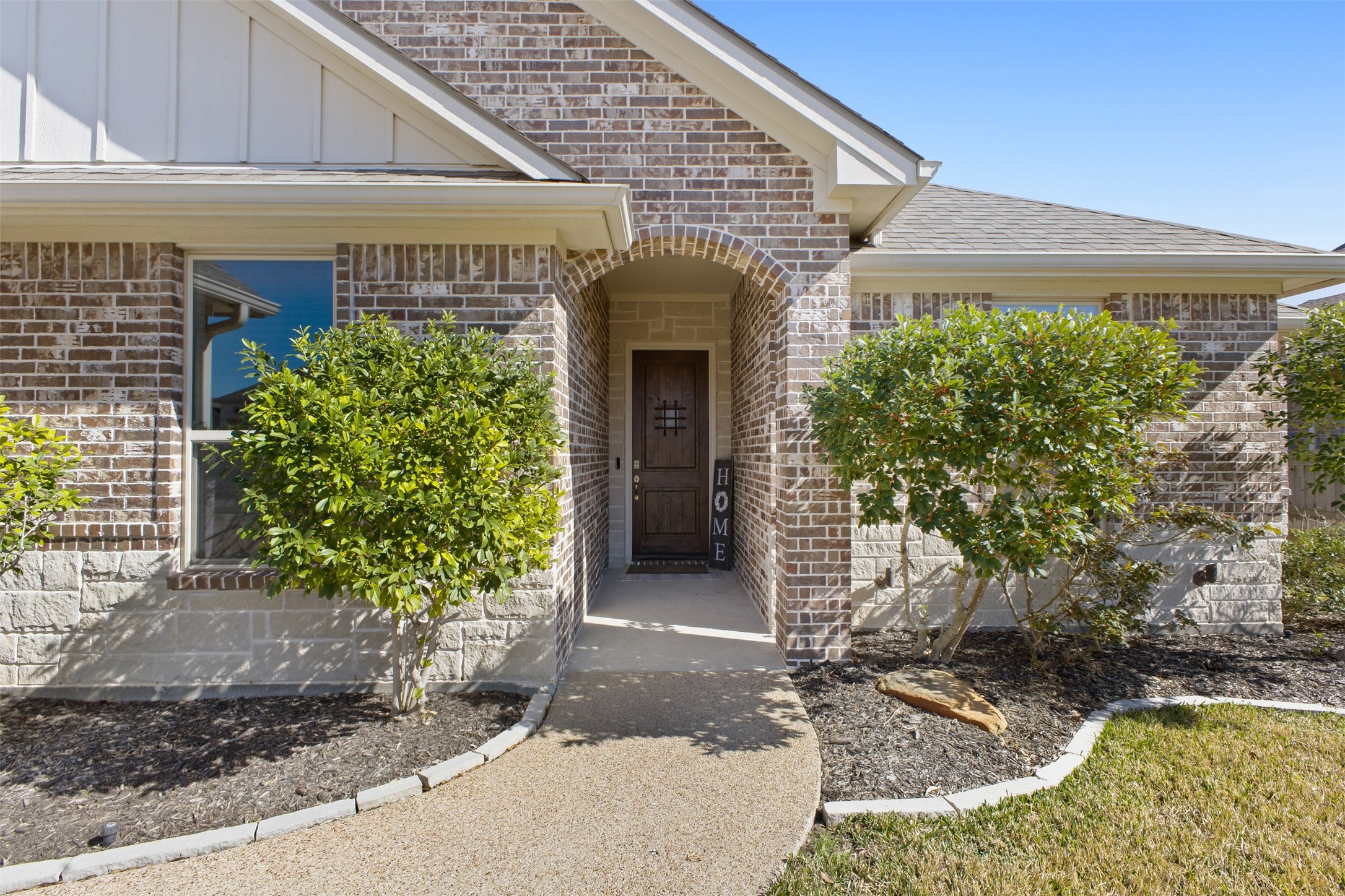3010 Nobel Court Bryan, TX 77808 - Photo 2 of 23 a front view of a house