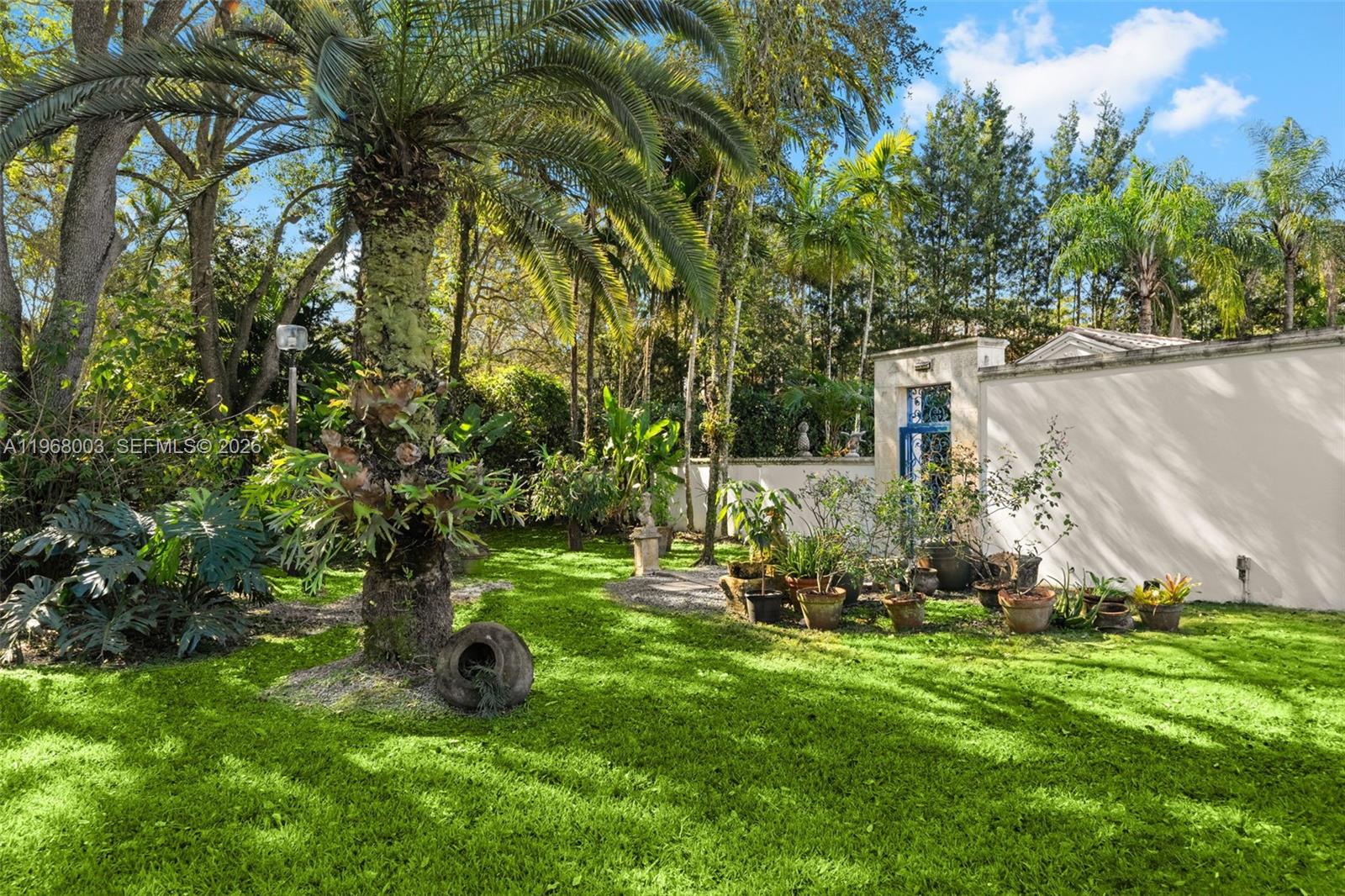 11220 Southwest 67th Avenue Pinecrest, FL 33156 - Photo 33 of 42 a view of outdoor space and yard