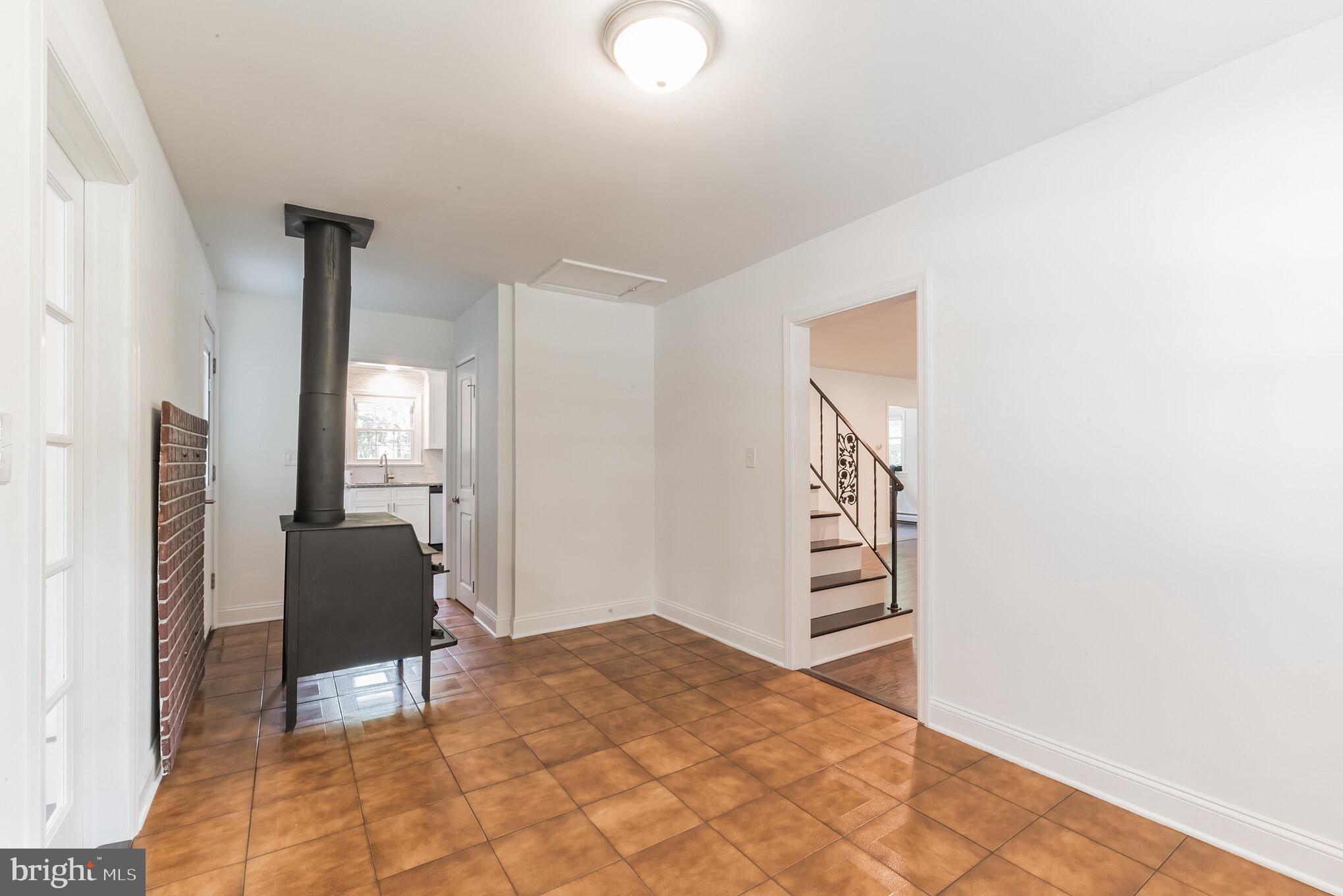 275 Dutch Mill Road Malaga, NJ 08328 - Photo 17 of 29 Vestibule with Wood Stove